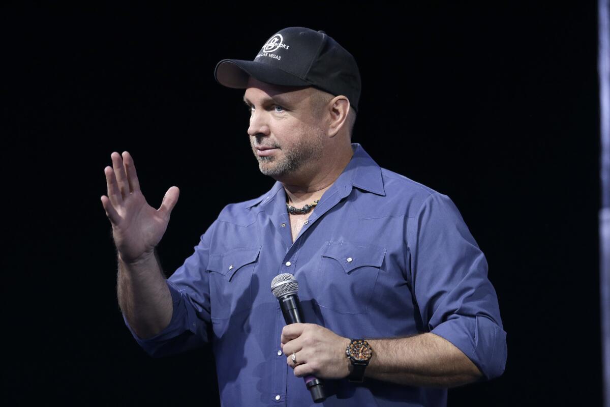 Country music star Garth Brooks, shown here at a July 10 news conference in Nashville, has listed his Malibu home for sale.
