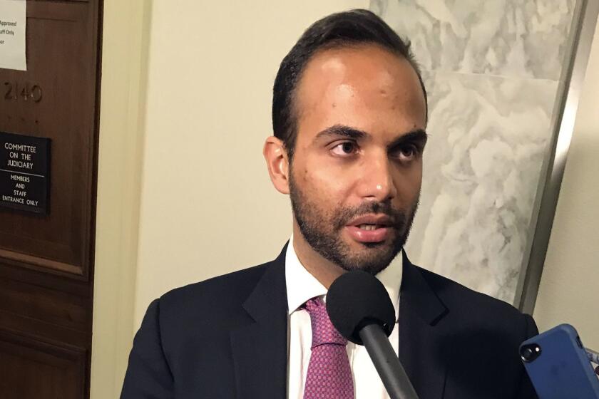 George Papadopoulos, the former Trump campaign adviser who triggered the Russia investigation, talks to reporters after his first appearance before congressional investigators, on Capitol Hill in Washington, Thursday, Oct. 25, 2018. (AP Photo/Mary Clare Jalonick)