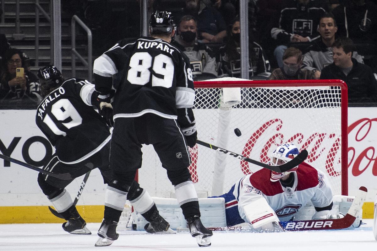 Kings right wing Alex Iafallo (19) scores past Canadiens goaltender Jake Allen on Oct. 30, 2021.