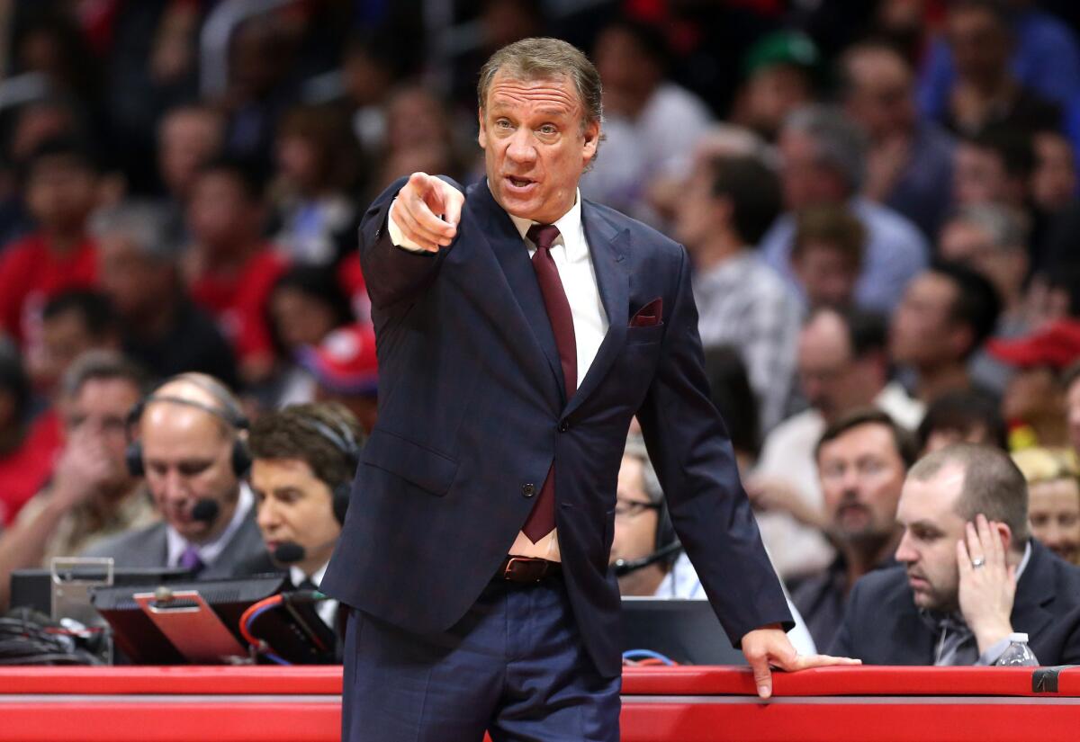 Flip Saunders, former coach of the Minnesota Timberwolves, gestures during a game with the Los Angeles Clippers at Staples Center on March 9, 2015.