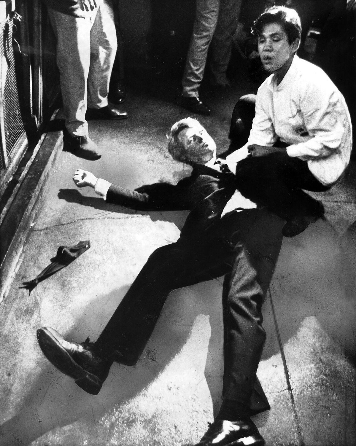 Presidential candidate Robert F. Kennedy lies on the floor at the Ambassador Hotel in Los Angeles moments after he was shot in the head. He had just finished his victory speech upon winning the California primary.