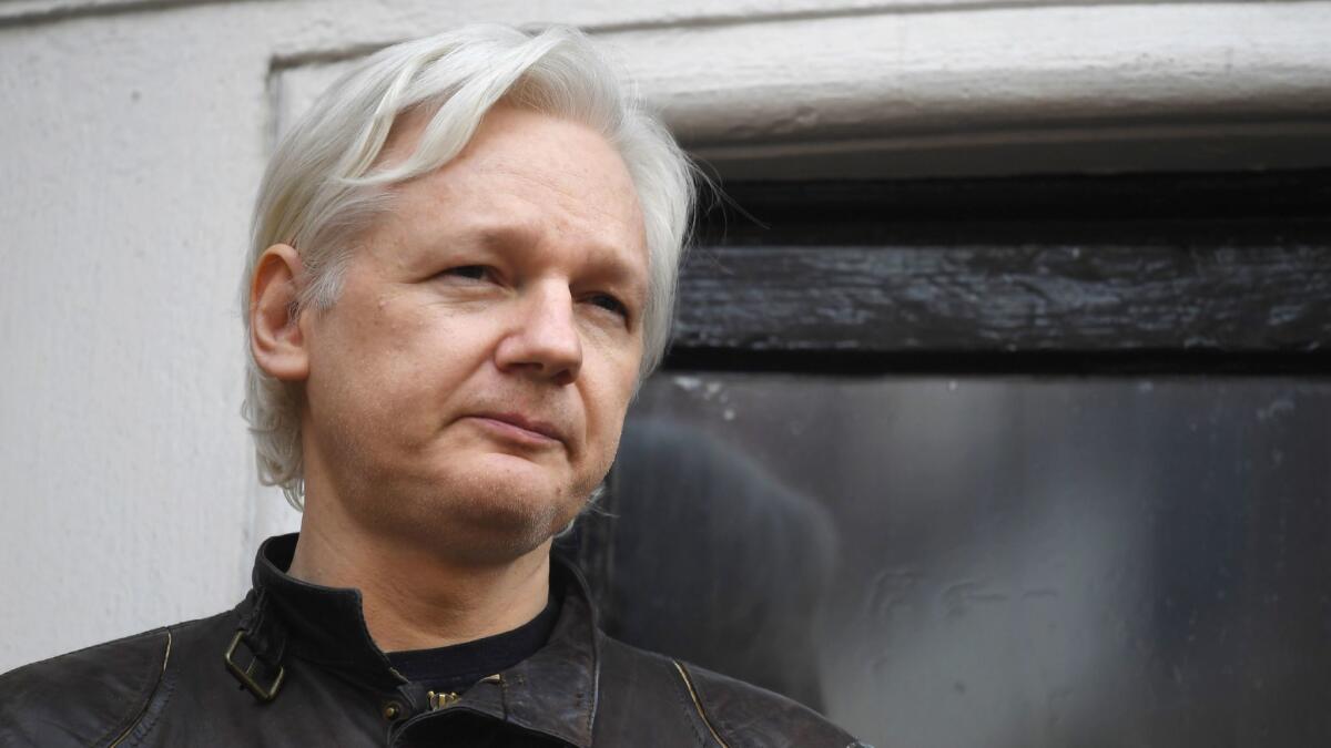 WikiLeaks founder Julian Assange speaks on the balcony of the Embassy of Ecuador in London on May 19, 2017.