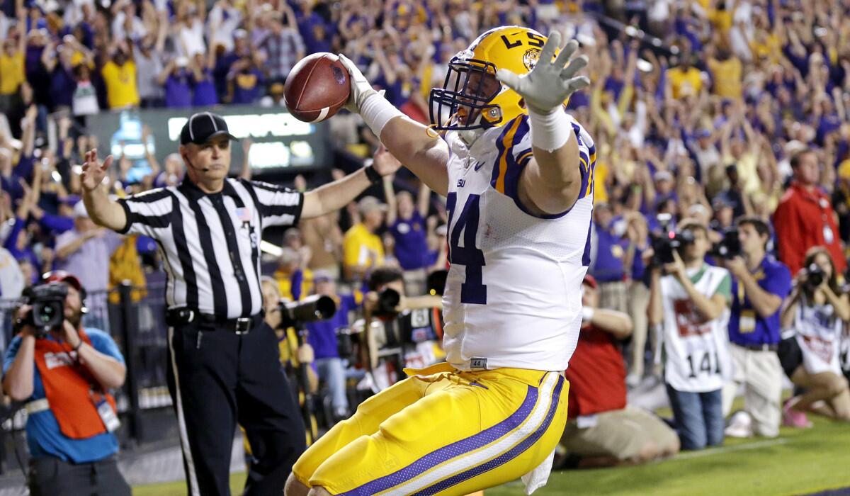 LSU tight end Logan Stokes celebrates his touchdown reception in the second half that gave the Tigers their winning margin in a 10-7 victory over No. 3-ranked Mississippi.