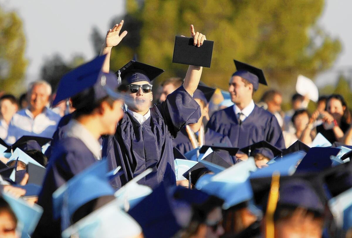 Crescenta Valley High School students celebrate during commencement in La Crescenta on Tuesday, June 4, 2013.