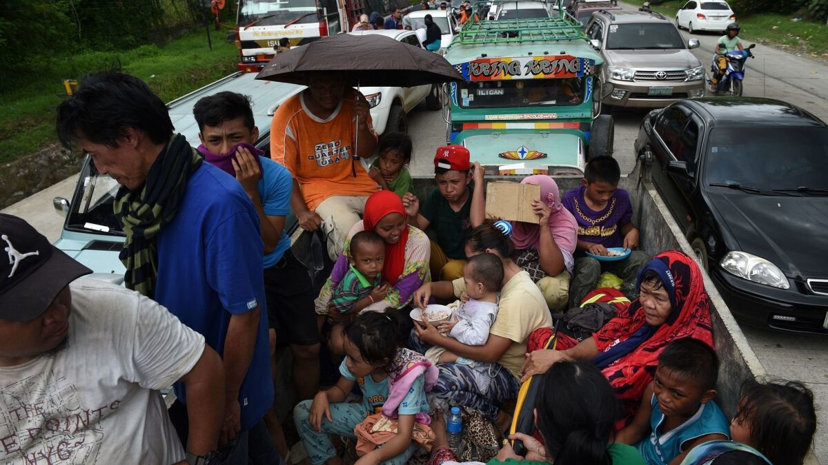 Residents fleeing Marawi city on May 24, 2017.