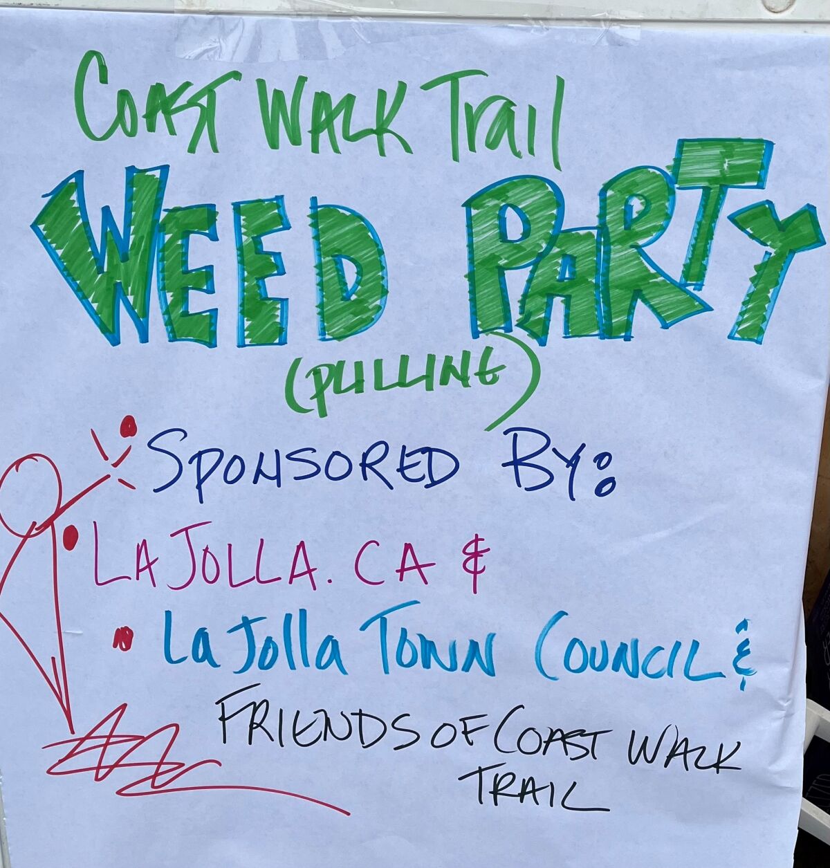 A sign welcomes volunteers to the March 26 Coast Walk Trail weed-pulling party.