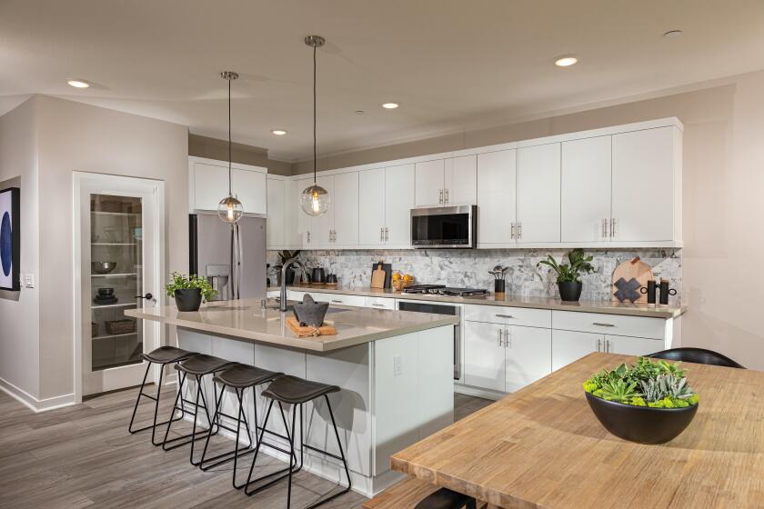 Plan Three in the Pomelo neighborhood at Citro offers a large open-concept kitchen that flows into the great room.