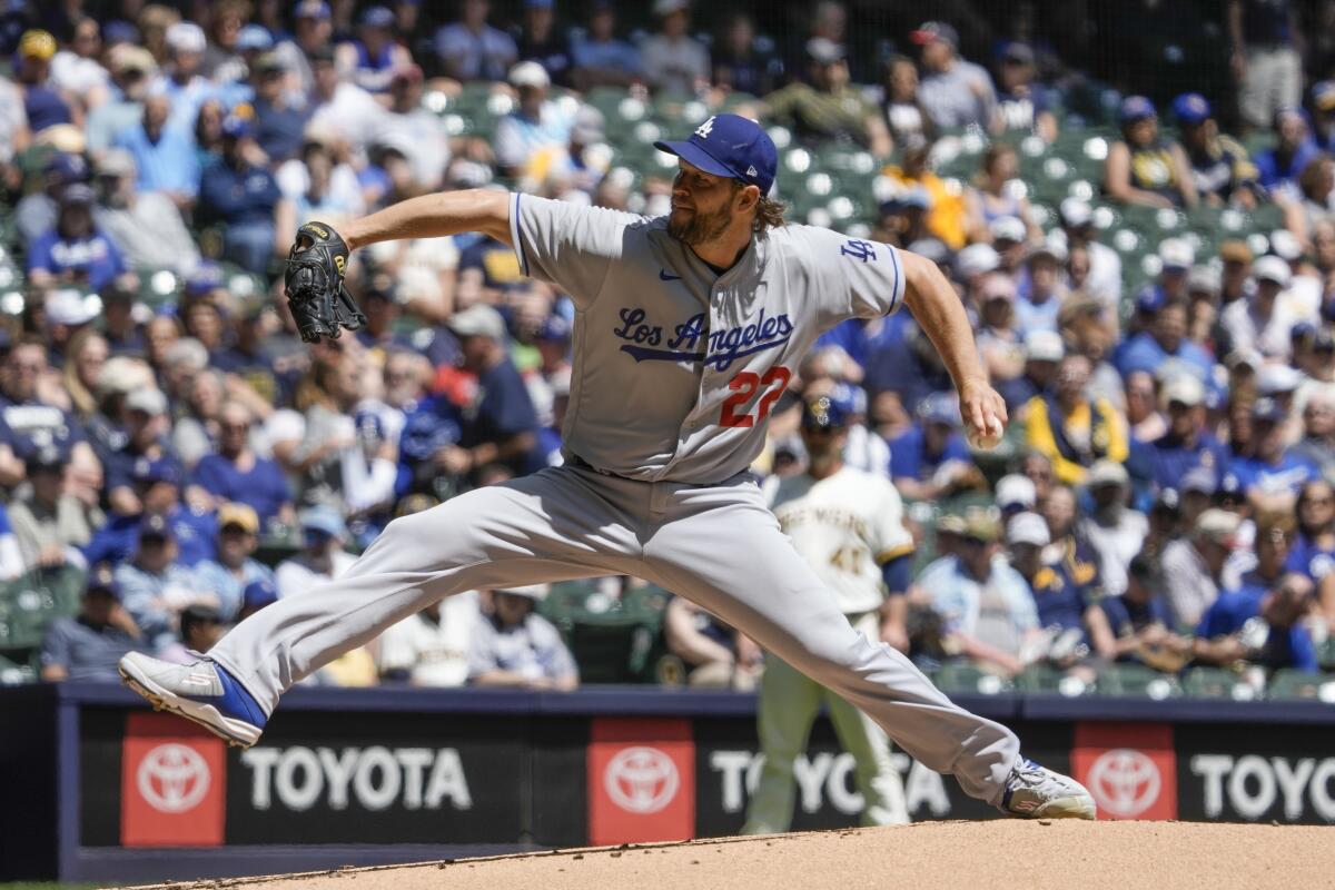 Clayton Kershaw of the Dodgers pitches in the first inning against the Milwaukee Brewers on Wednesday in Milwaukee.