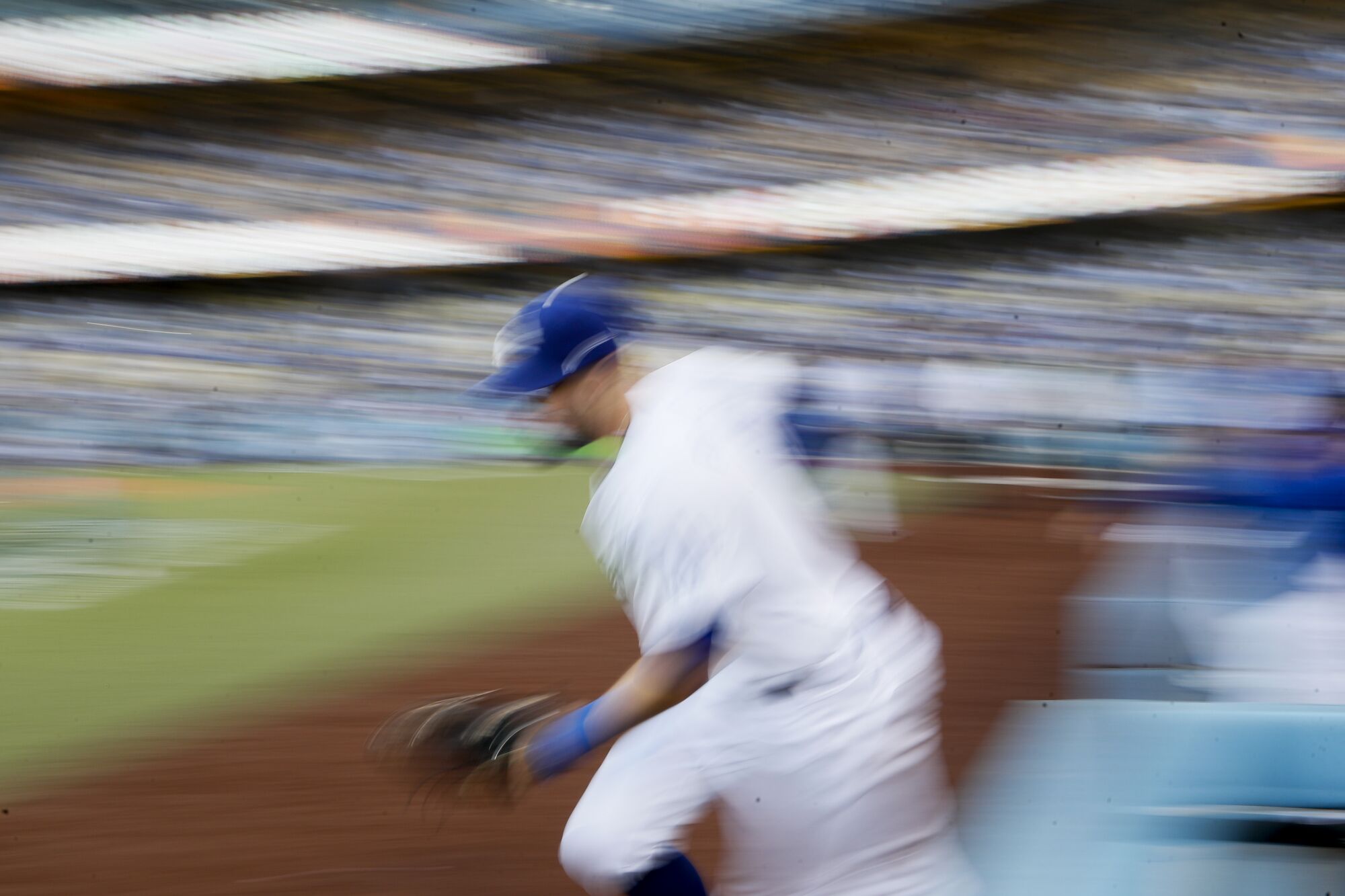 Dodgers' AJ Pollock takes the field