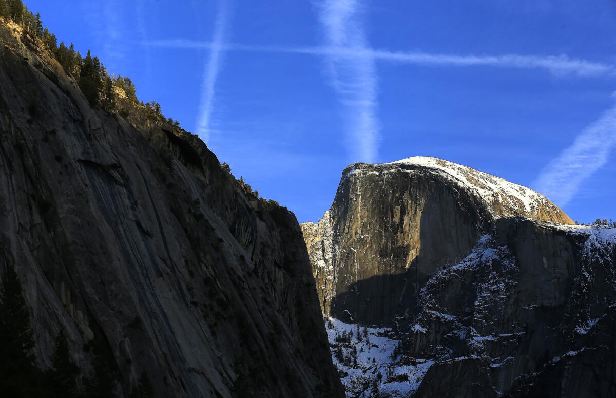 Half Dome, right, in Yosemite National Park.