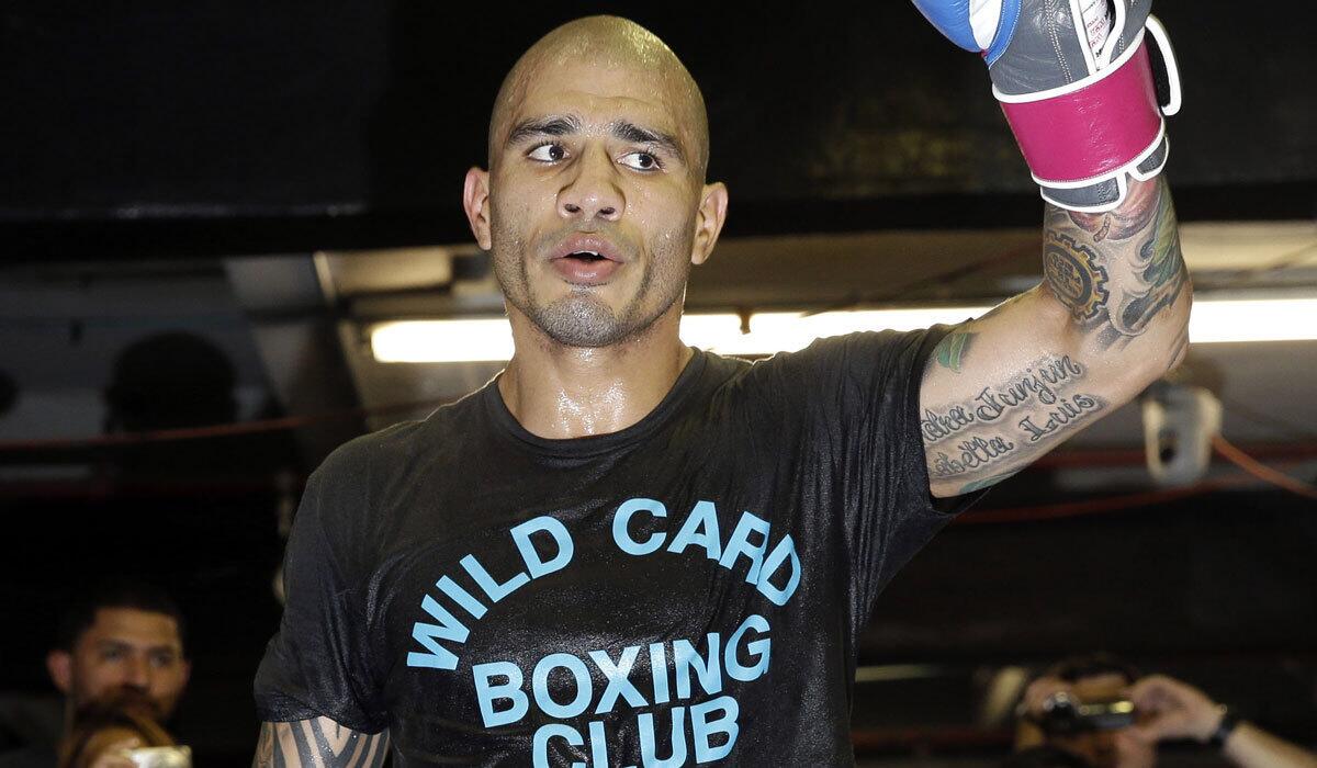 Boxer Miguel Cotto works out at a gym in Brooklyn on June 3. The 35-year-old faces Saul “Canelo” Alvarez, 25, on Nov. 21 for the middleweight championship.