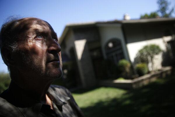 George Souliotes, 72, gazes skyward outside a house in Escondido, Calif. One of the first statements he made while walking out of a Stanislaus County prison in July was, "I see the sun. It's beautiful."