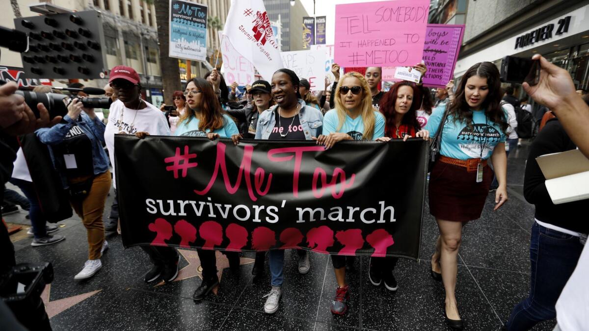 Tarana Burke, center, at the #MeToo Survivors' March against sexual abuse in Hollywood on Nov. 12, 2017.