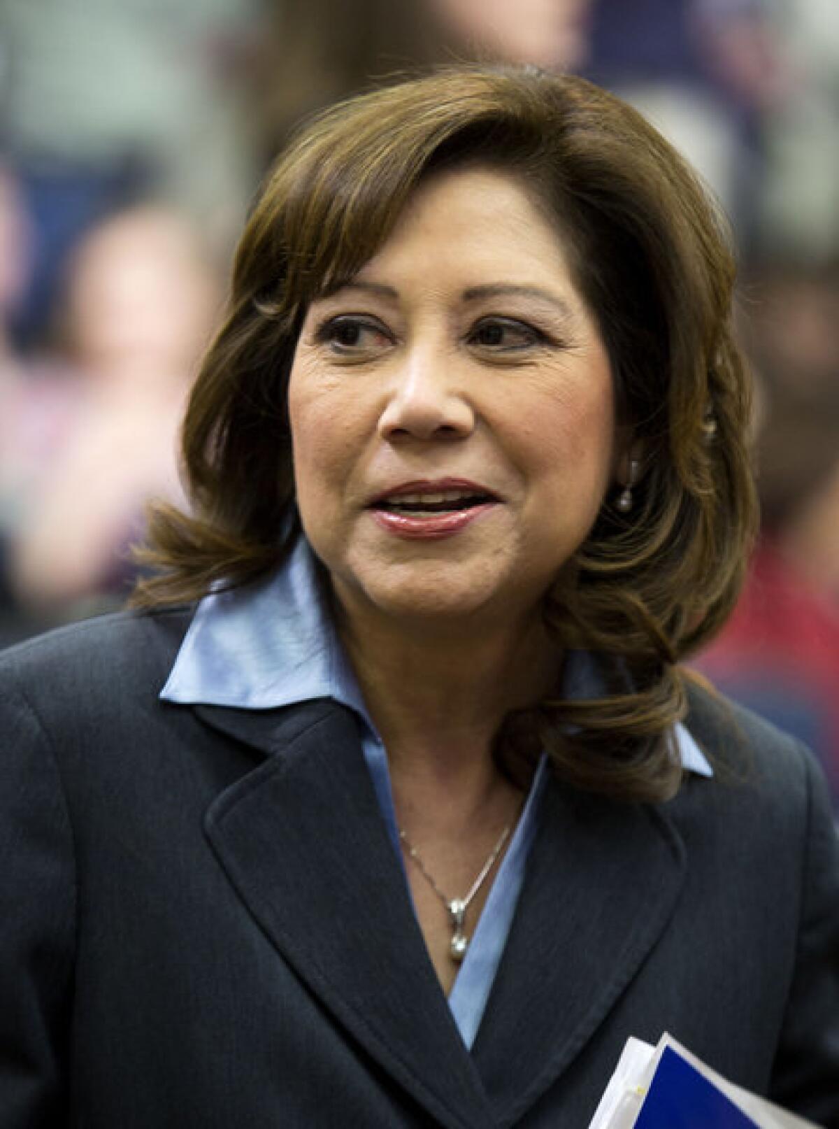 Then-Secretary of Labor Hilda Solis arrives for President Obama's address to the White House Forum on 'Women and the Economy in April 2012.