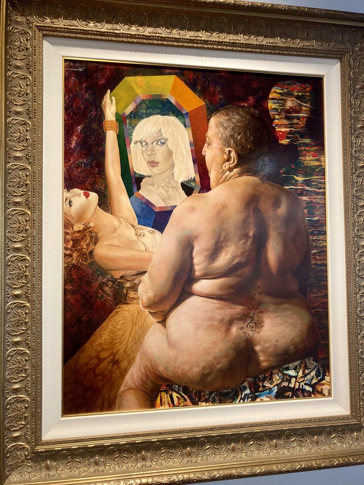 "Kristine at a Mirror," an acrylic and oil painting by Carson Grubaugh, on display Wednesday at Coastline Art Gallery.