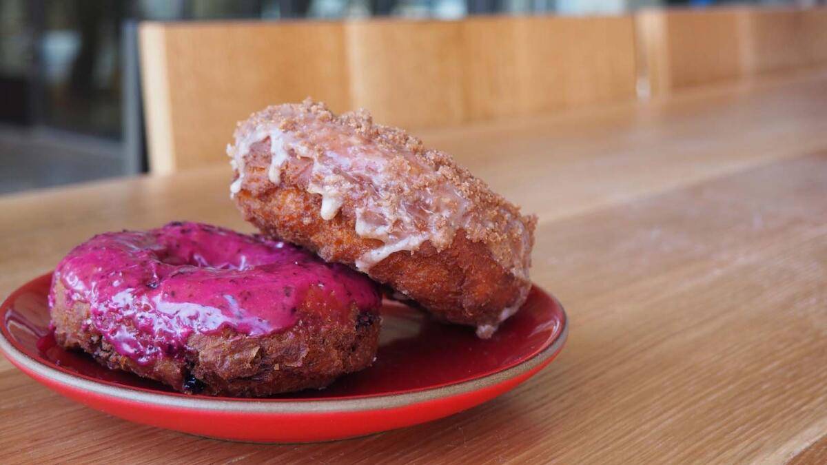 Huckleberry and cinnamon doughnuts from Sidecar Doughnuts, opening soon in Santa Monica.