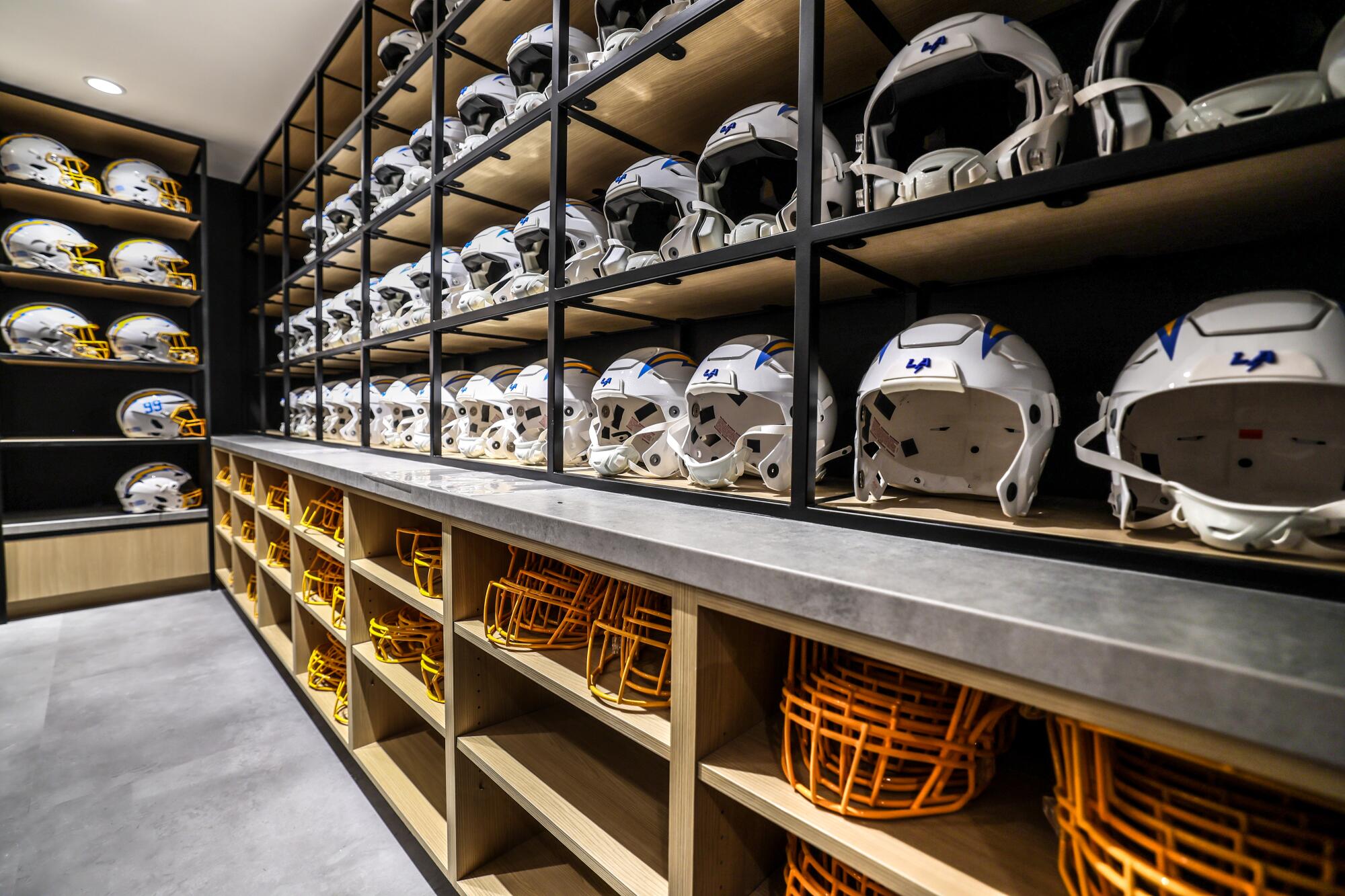 Dozens of helmet samples are in stock and ready for custom fittings of Chargers players at "The Bolt."  