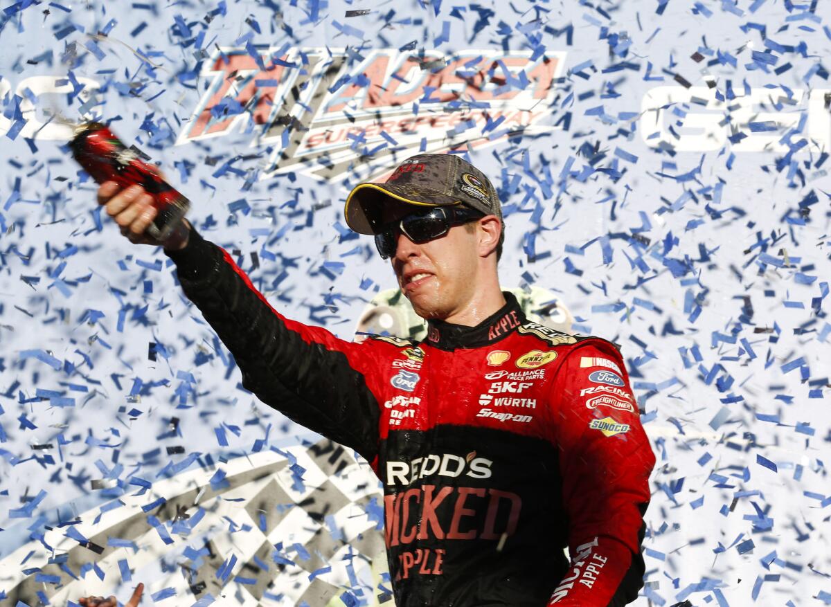 Brad Keselowski celebrates after winning a NASCAR Sprint Cup Series race at Talladega on Sunday.