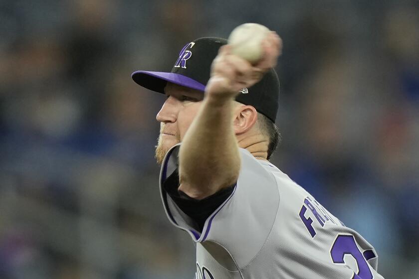 Colorado Rockies pitcher Kyle Freeland throws against the Toronto Blue Jays during second-inning baseball game action in Toronto, Sunday, April 14, 2024. (Frank Gunn/The Canadian Press via AP)