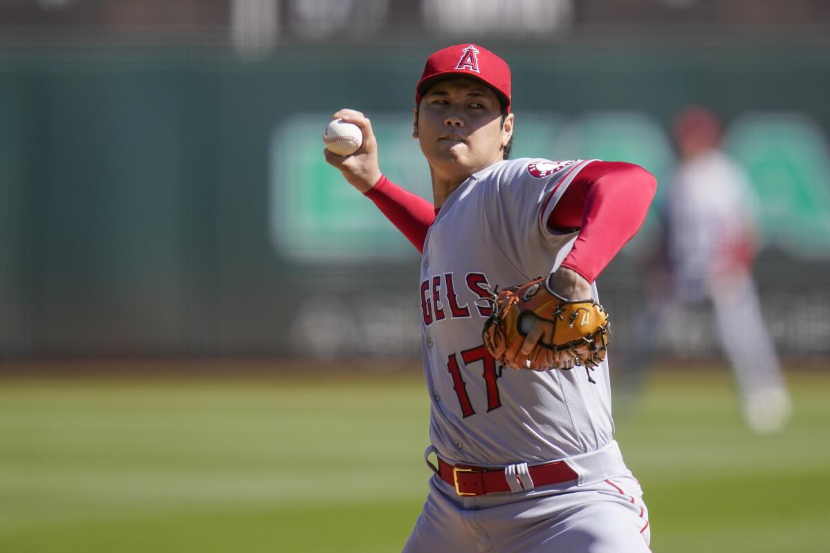 Angels pitcher Shohei Ohtani pitches delivers against the Oakland Athletics on Oct. 5. 