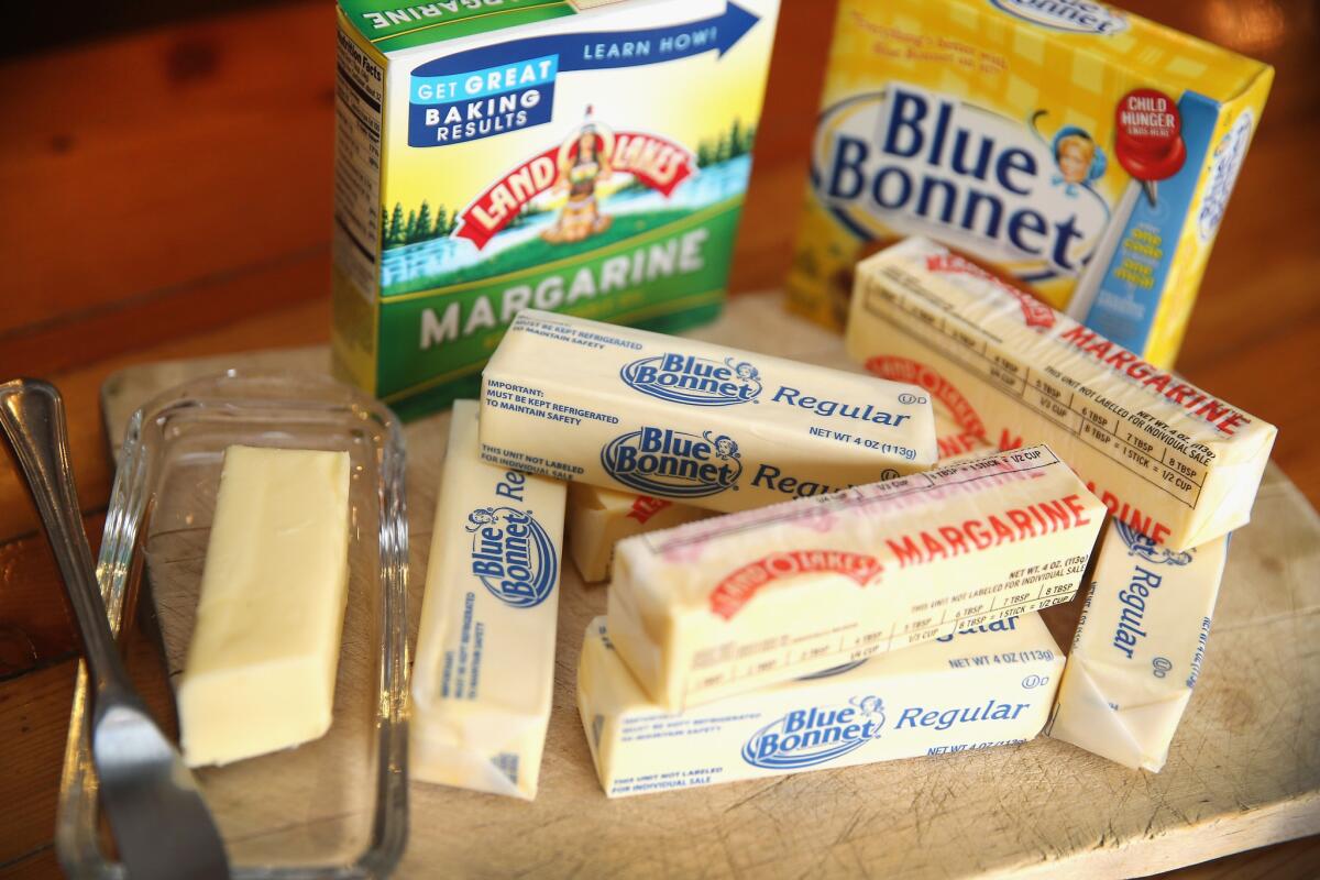 Stick margarine and other food items which contain trans fat are shown in Chicago, Illinois. The FDA announced it has banned partially hydrogenated oils from the U.S. food supply.
