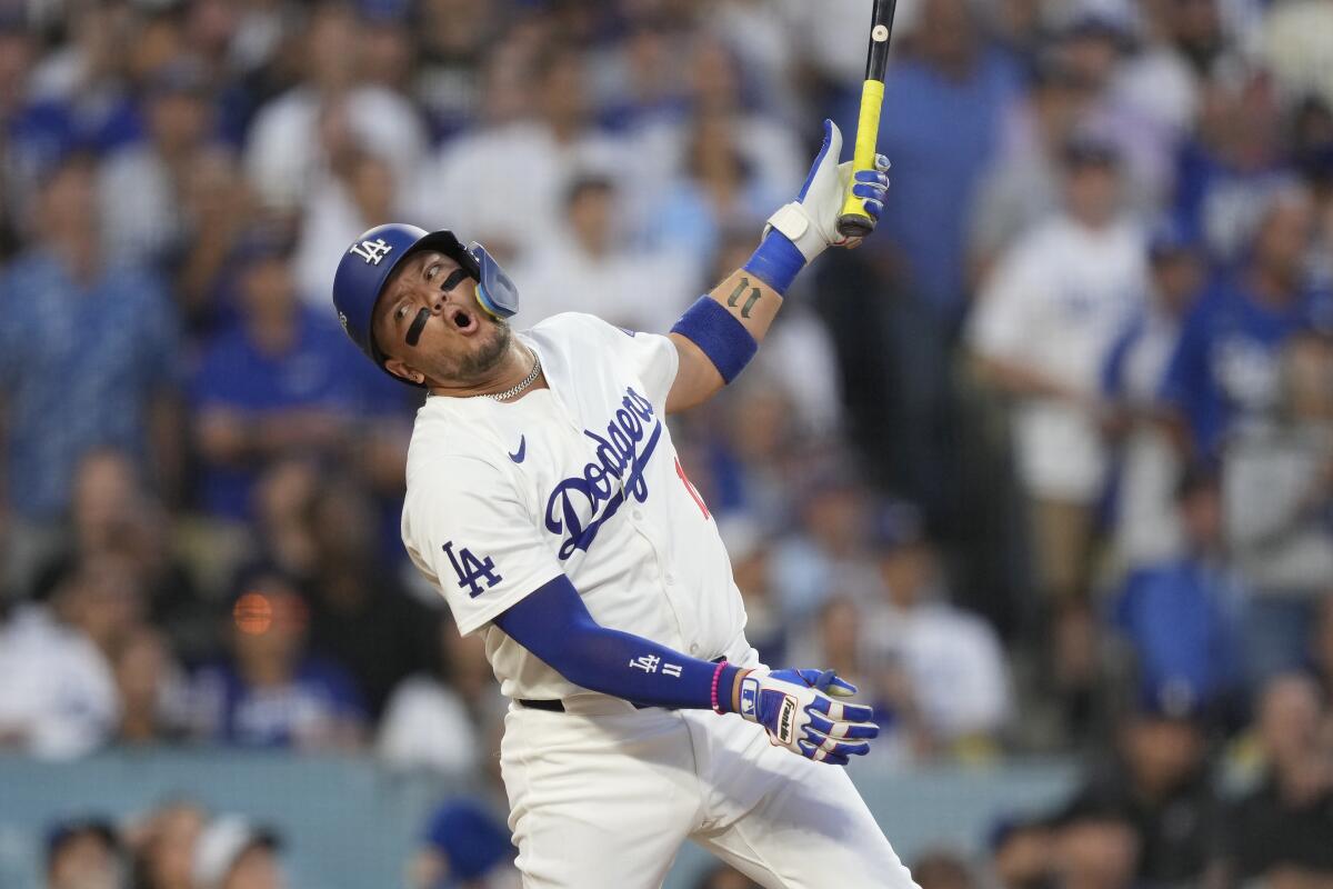 Miguel Rojas reacts during Game 1 of the NLDS between the Dodgers and Padres on Saturday.