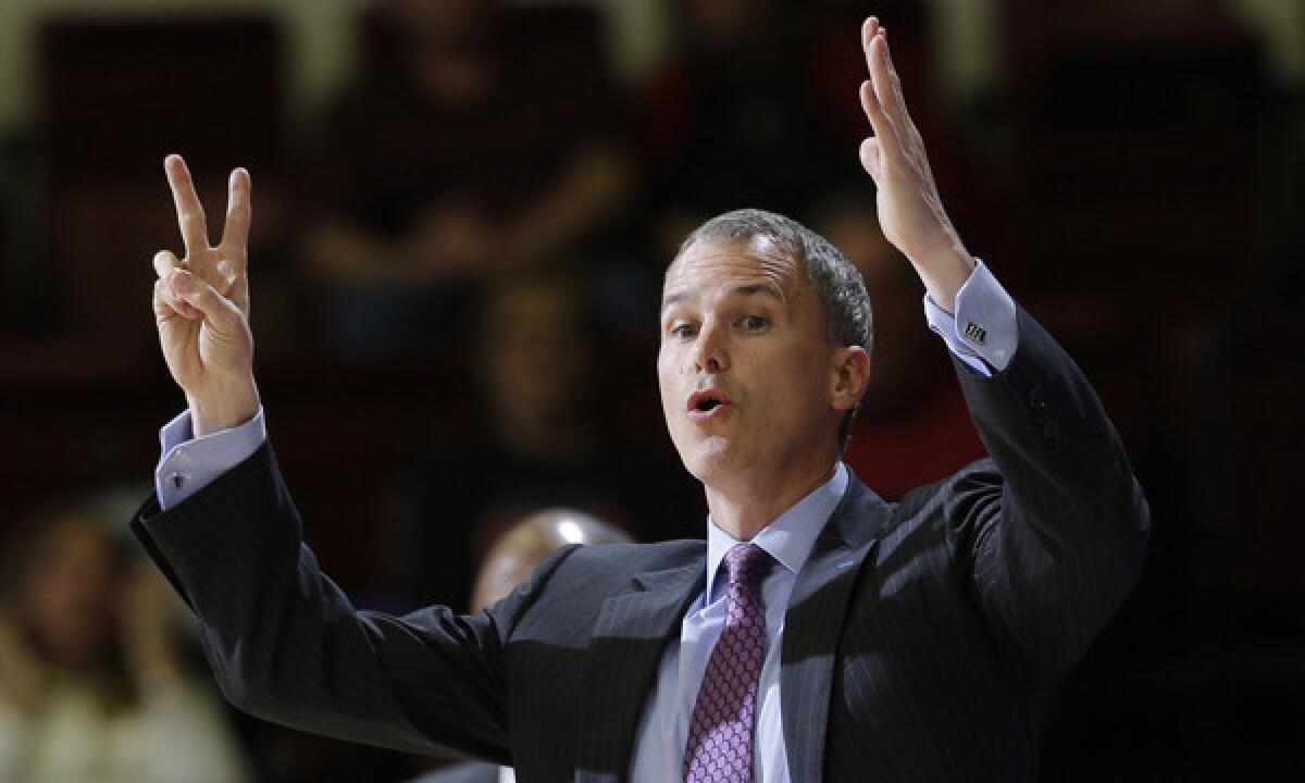 USC Coach Andy Enfield instructs his players during a loss to Stanford on Thursday.
