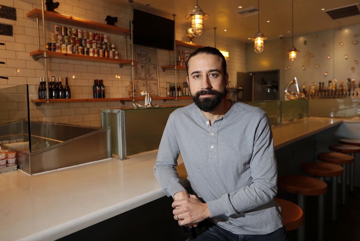 Chef Andrew Gruel is pictured at the Huntington Beach location of the Slapfish restaurant, which he founded, in 2021.