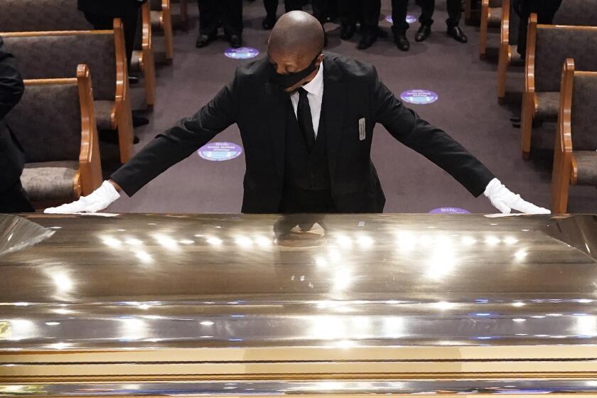 The casket of George Floyd is placed in the chapel during a funeral service for Floyd at the Fountain of Praise church, Tuesday, June 9, 2020, in Houston. (AP Photo/David J. Phillip, Pool)