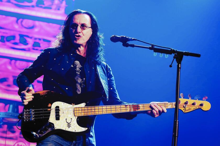 Singer and bassist Geddy Lee of Rush performs in Philadelphia in June. He says diet and exercise keep him in fine form for touring.