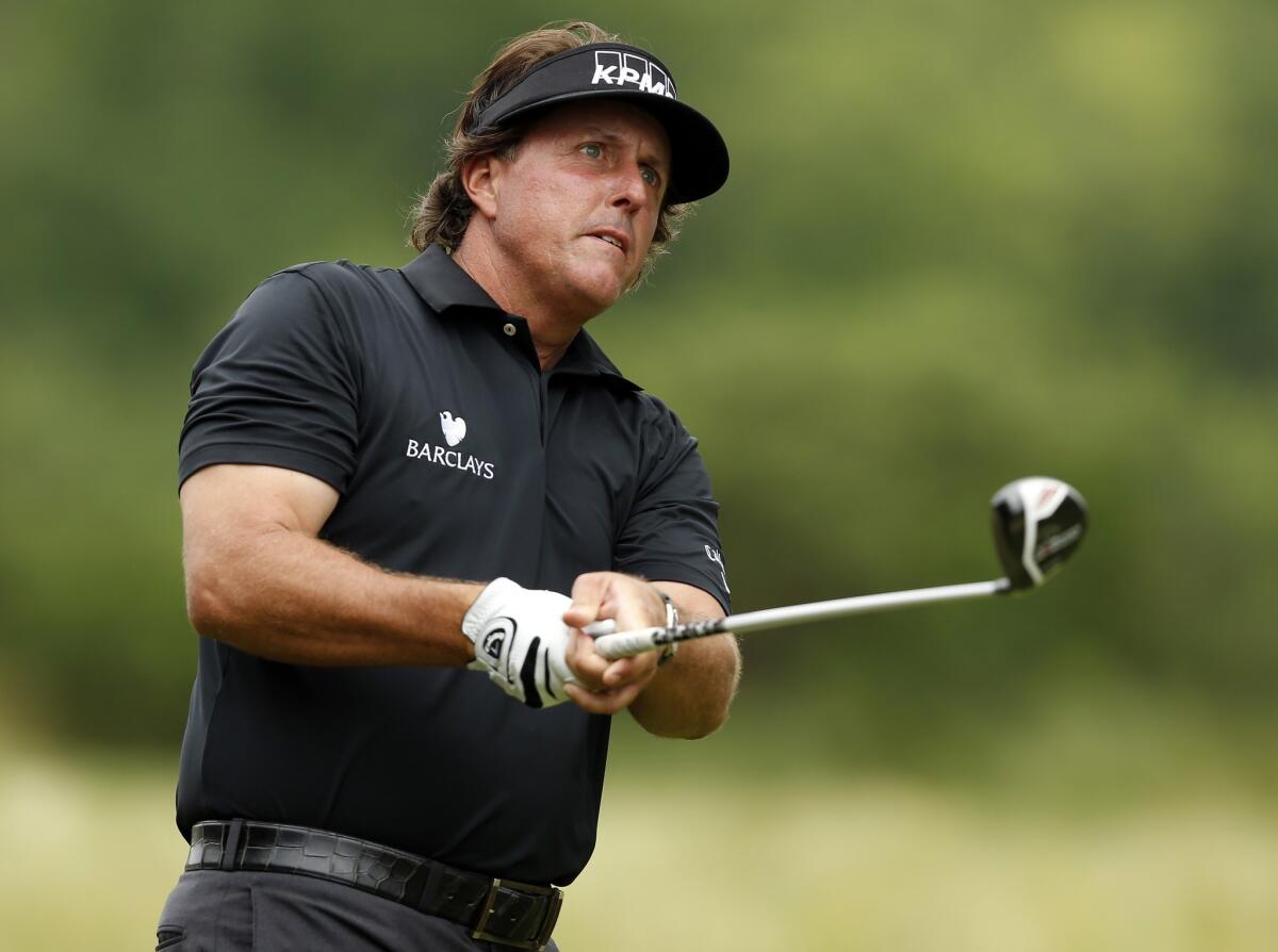 Phil Mickelson recovered from an opening-hole bogey with a pair of birdies early in the first round of the U.S. Open.