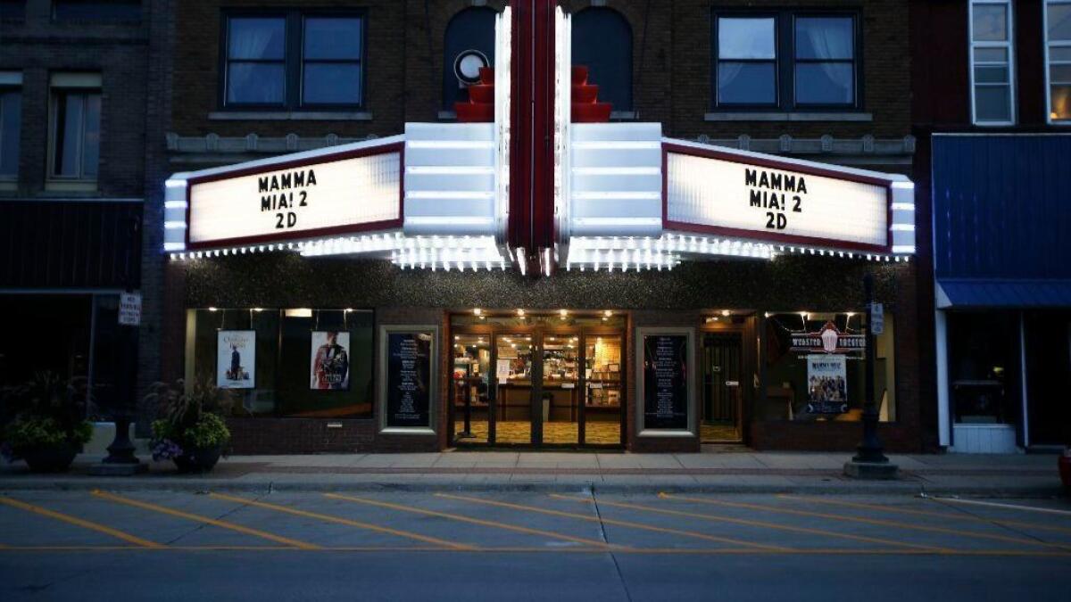 The marquee is lit up for the 7 p.m. showing of "Mamma Mia 2" at the Webster Theater in Webster City, Iowa, on Aug. 18.