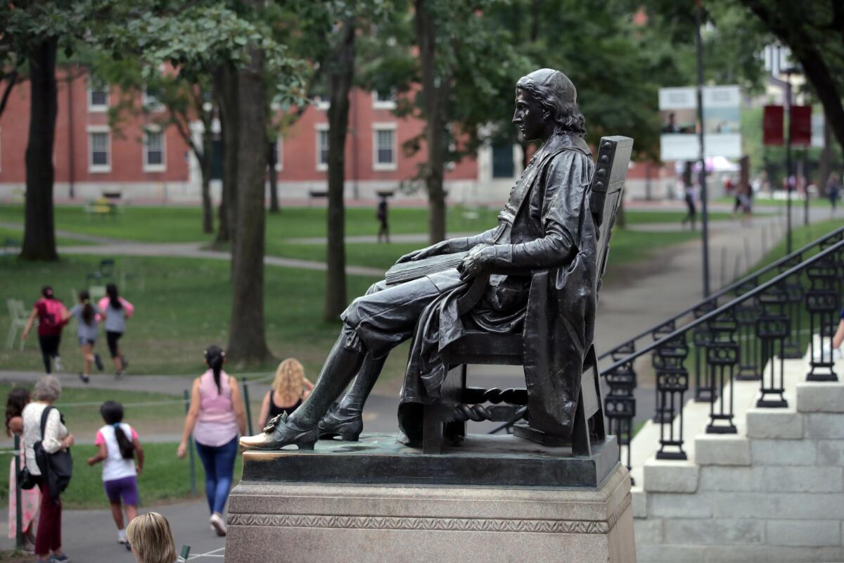 Statue of John Harvard in Harvard Yard