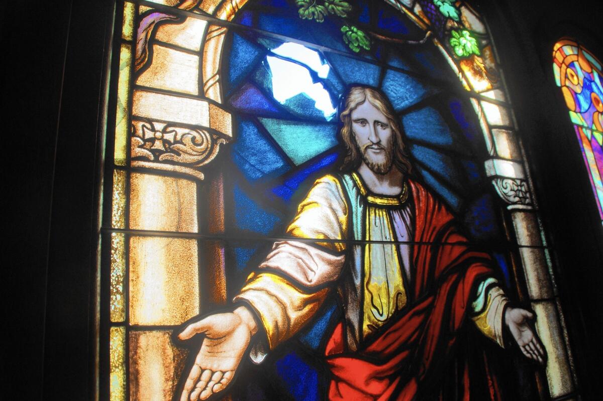 A 90-year-old stained-glass window at Costa Mesa’s First United Methodist Church has a hole where a vandal threw a brick through it, church leaders said. Someone also drew two pentagrams there, they said.