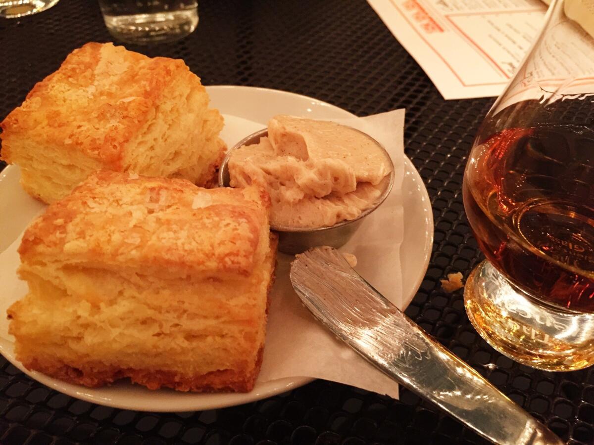 The buttermilk biscuits at ERB in the Arts District, with bourbon