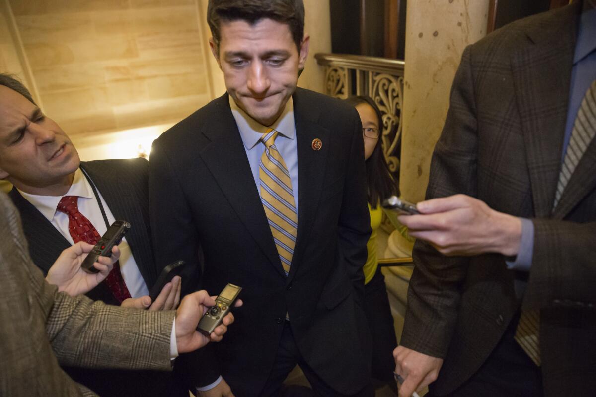 House Budget Committee Chairman Rep. Paul Ryan (R-Wis.) last year's Republican vice presidential nominee, is pursued by reporters on Capitol Hill in Washington, following a closed-door GOP meeting regarding the federal budget.