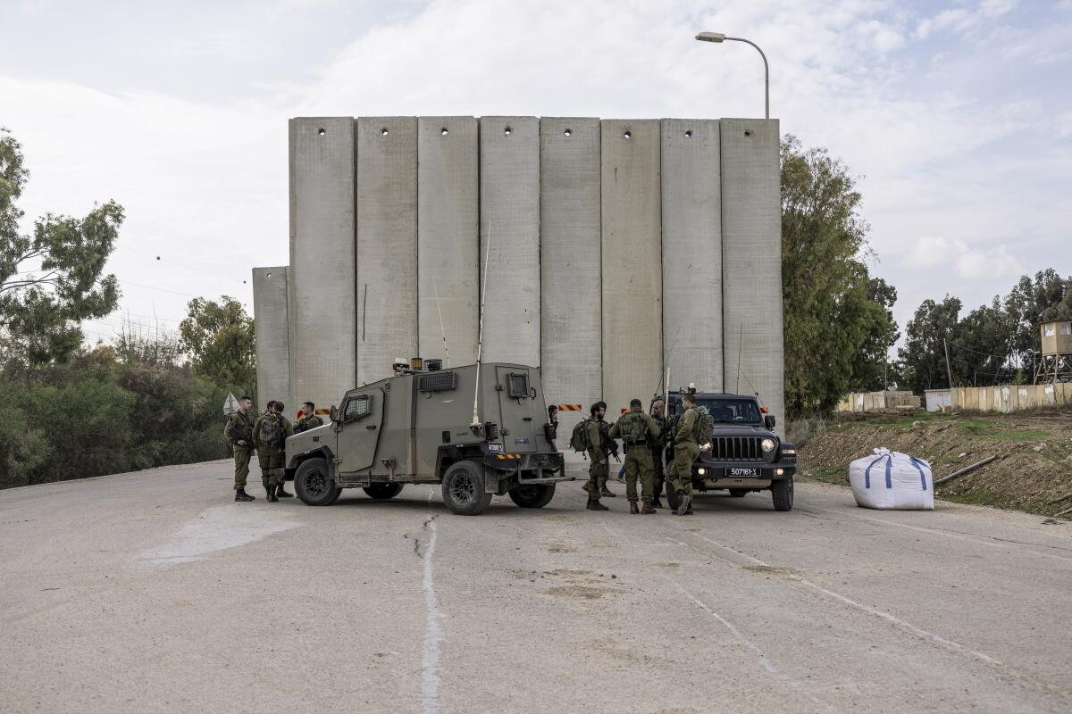 Israeli soldiers deploy on the Israel and Gaza border