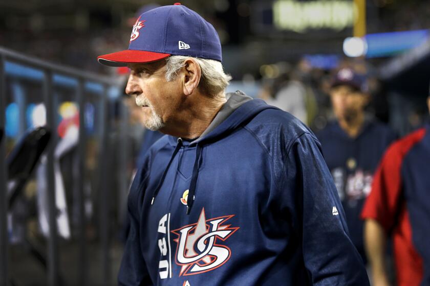 U.S. Manager Jim Leyland keeps an eye on the action during an 8-0 victory over Puerto Rico in the World Baseball Classic championship game at Dodger Stadium on Wednesday night.