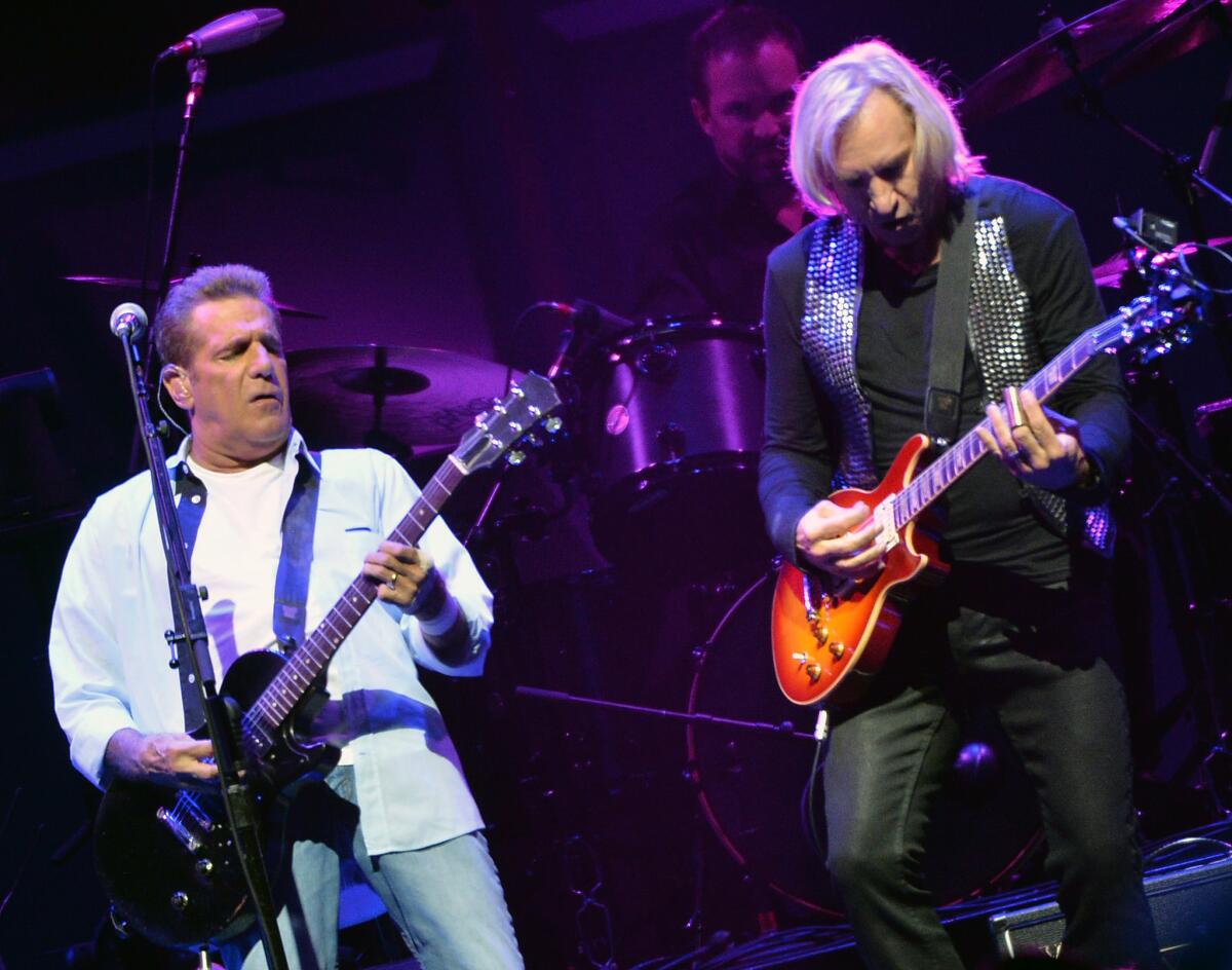 Glen Frey, left, and Joe Walsh of the Eagles perform during "History of the Eagles Live In Concert" in Nashville, Tenn.