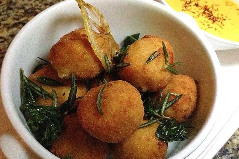 Lobster fritters are served with a saffron aioli.