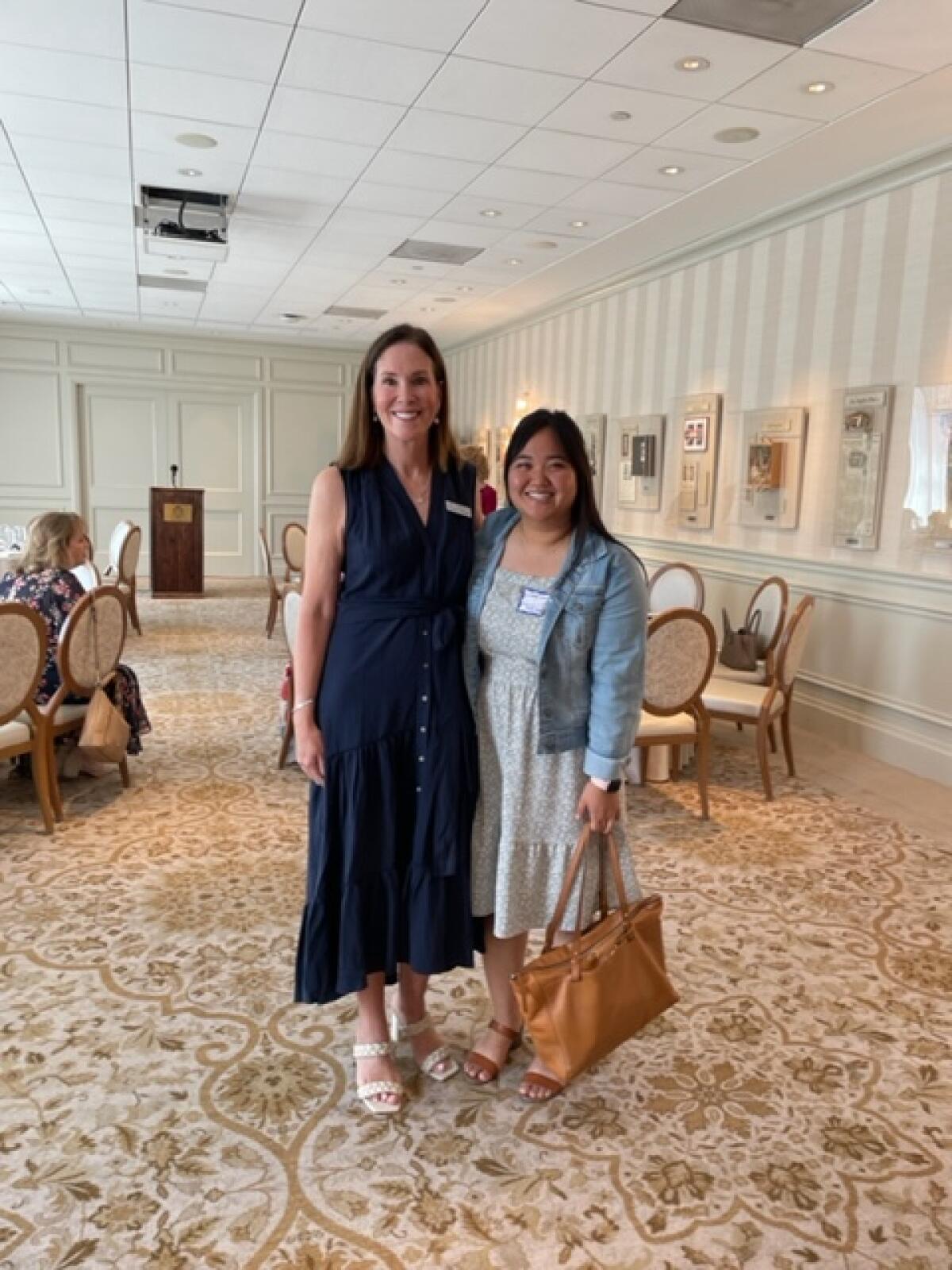 Madeline Hayward, president of DARTS, and Lizzy Lowe of Hope Harbor at the DARTS grants presentation luncheon.