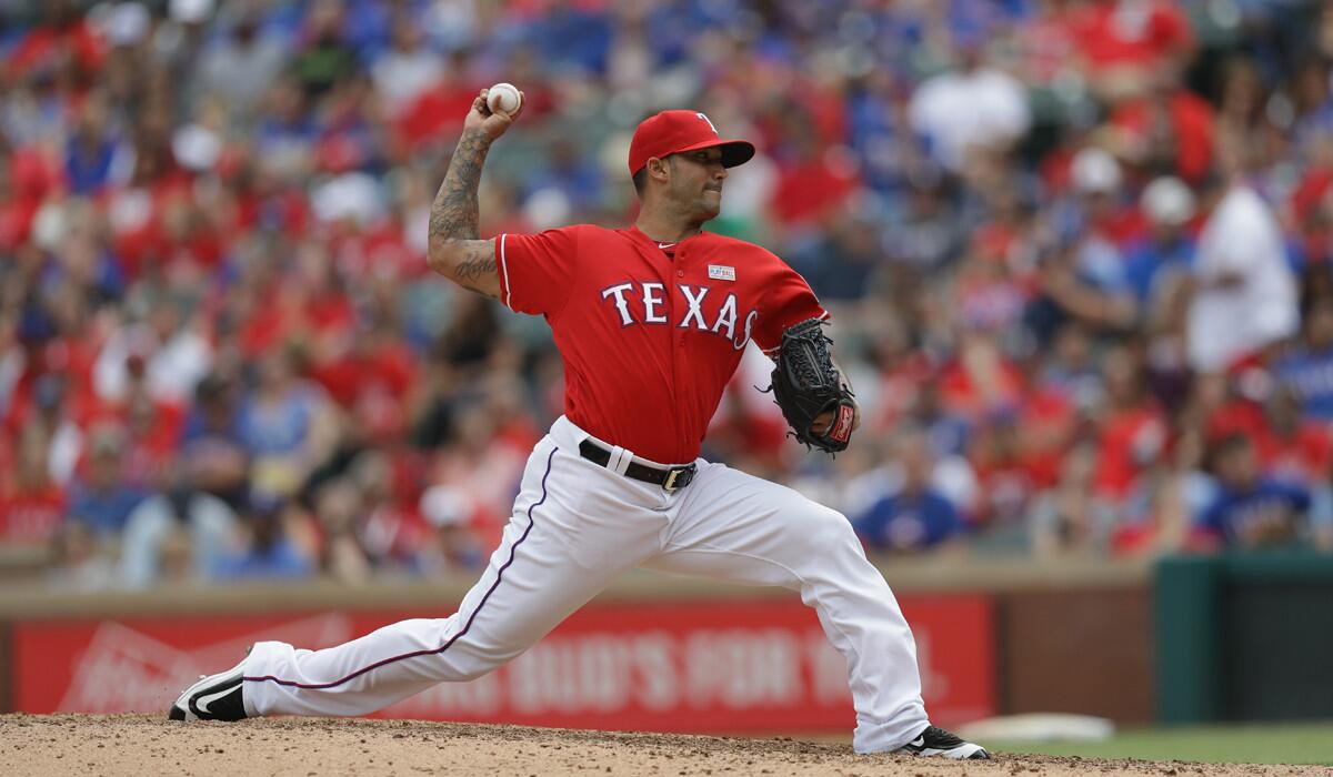 Texas Rangers pitcher Matt Bush throws against the Toronto Blue Jays in Arlington, Texas, on May 15.