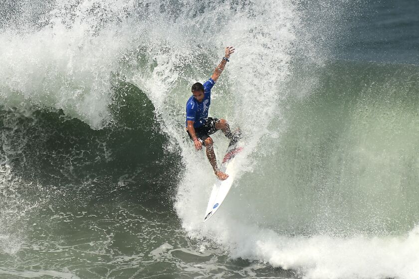 -SP-June 3, 2021: A surfer rides a wave in the ISA World Surfing Games at Surf City in El Salvador.