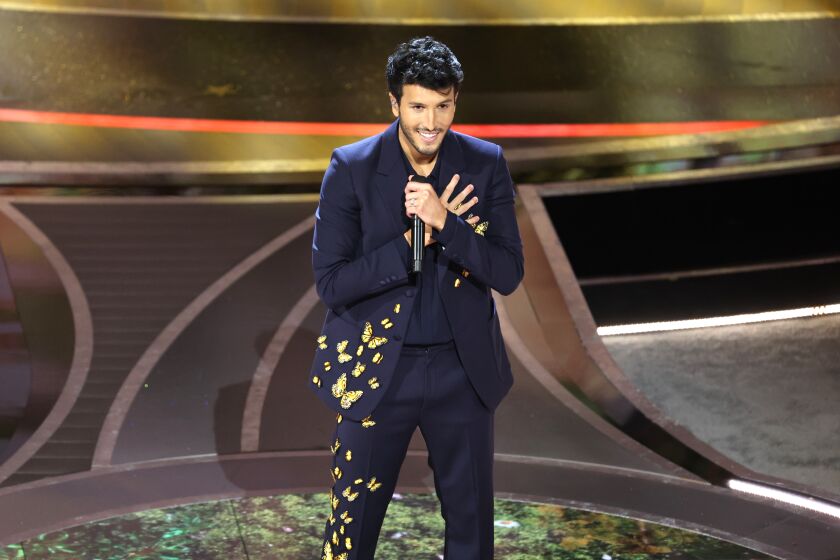 HOLLYWOOD, CA - March 27, 2022. Sebastián Yatra performs during the show at the 94th Academy Awards at the Dolby Theatre at Ovation Hollywood on Sunday, March 27, 2022. (Myung Chun / Los Angeles Times)
