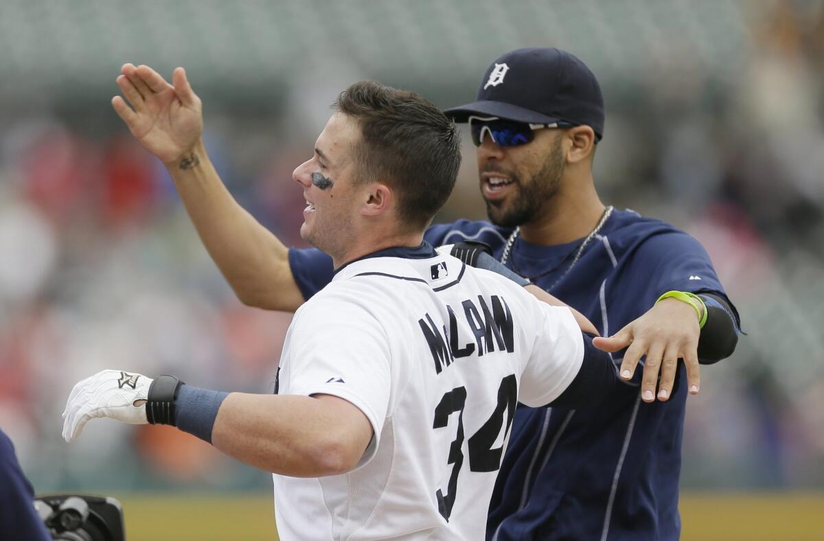 Detroit's James McCann is congratulated by pitcher David Price after hitting a walk-off home run during the 11th inning Thursday against Houston.