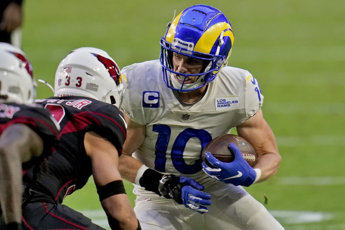 Rams wide receiver Cooper Kupp runs after making a catch against the Arizona Cardinals on Dec. 6.