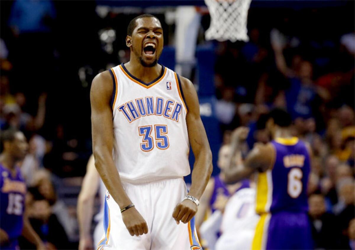 Thunder forward Kevin Durant (35) celebrates a basket against the Lakers.
