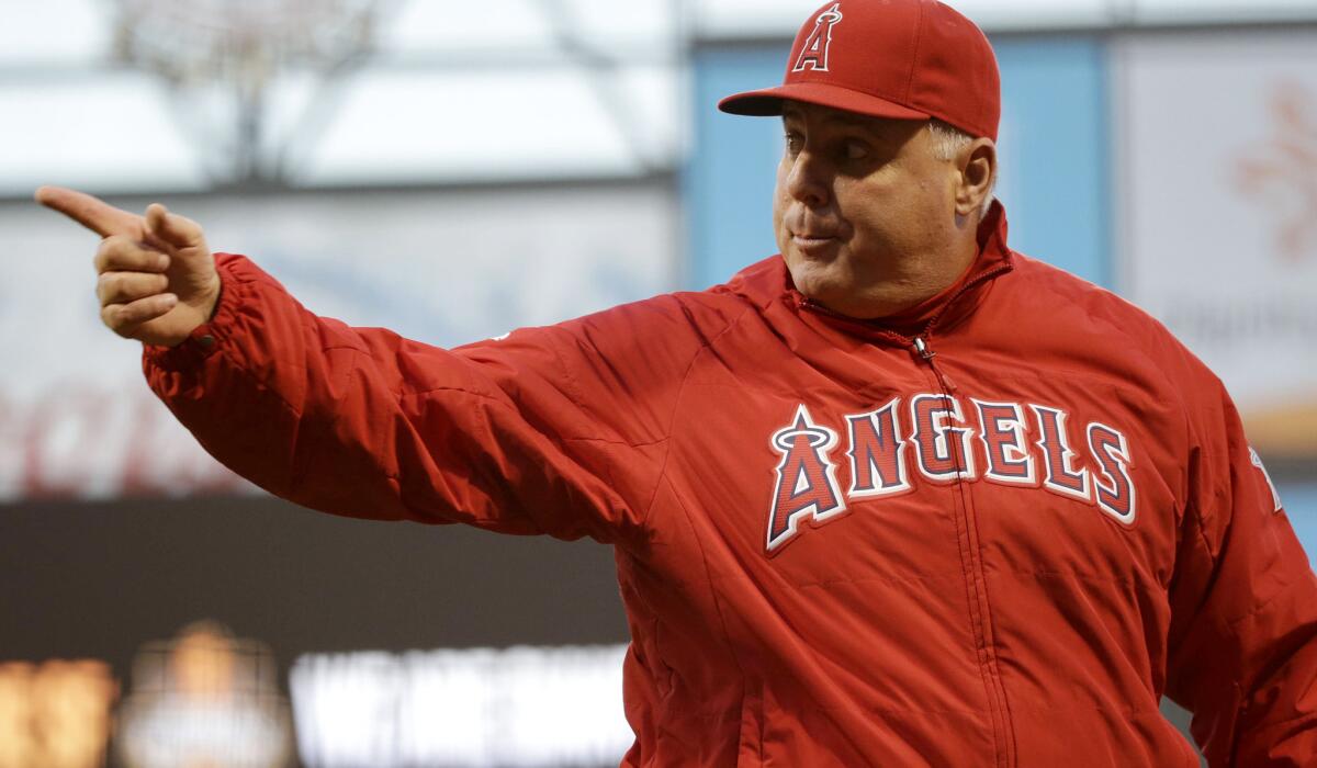 Angels Manager Mike Scioscia argues a call during the third inning of the game Friday night in San Francisco.