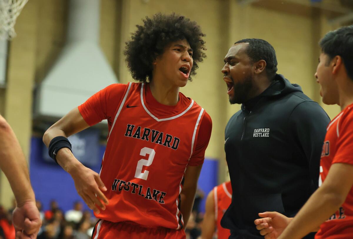 Robert Hinton is emotional for Harvard-Westlake after a dunk to end the third quarter against Sierra Canyon.
