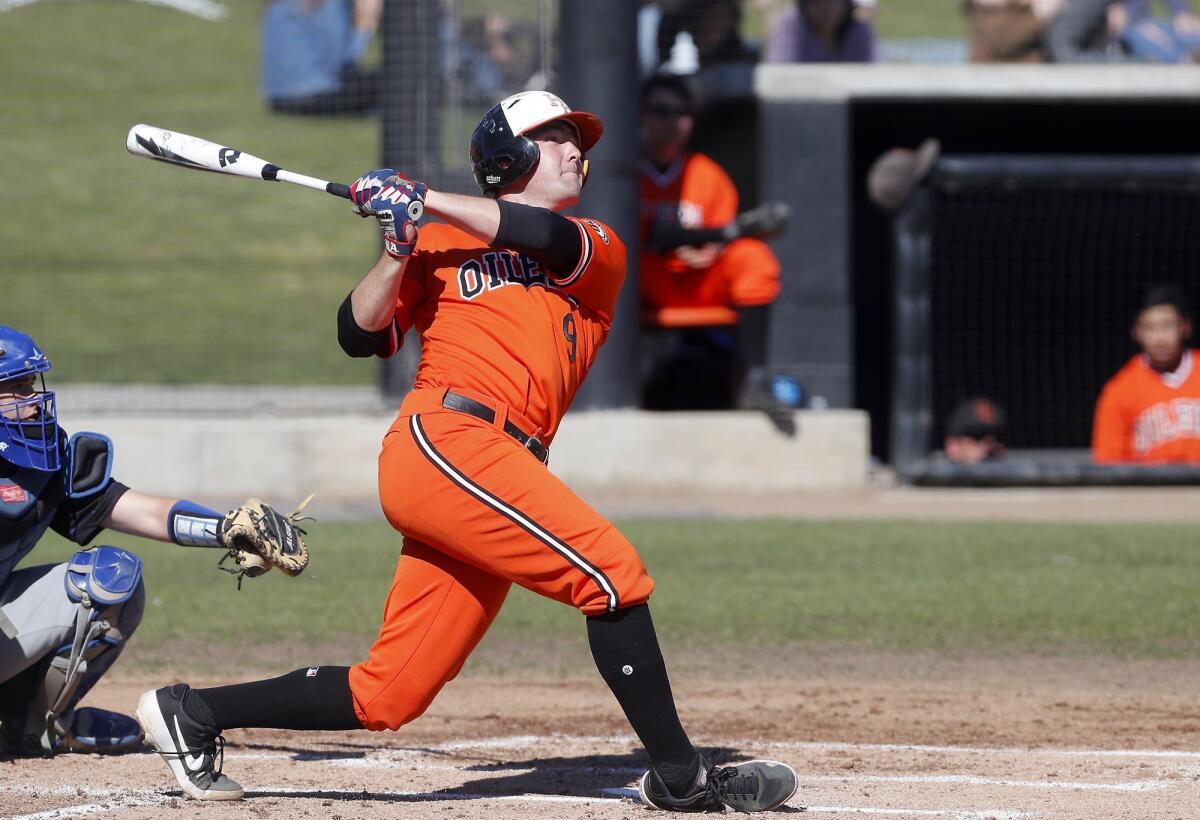 Huntington Beach High's Josh Hahn, seen hitting a triple against Fountain Valley on March 15, belted a two-run homer in the Oilers' 11-2 win over Northwest Guilford in Wednesday's National High School Invitational opener in Cary, N.C.